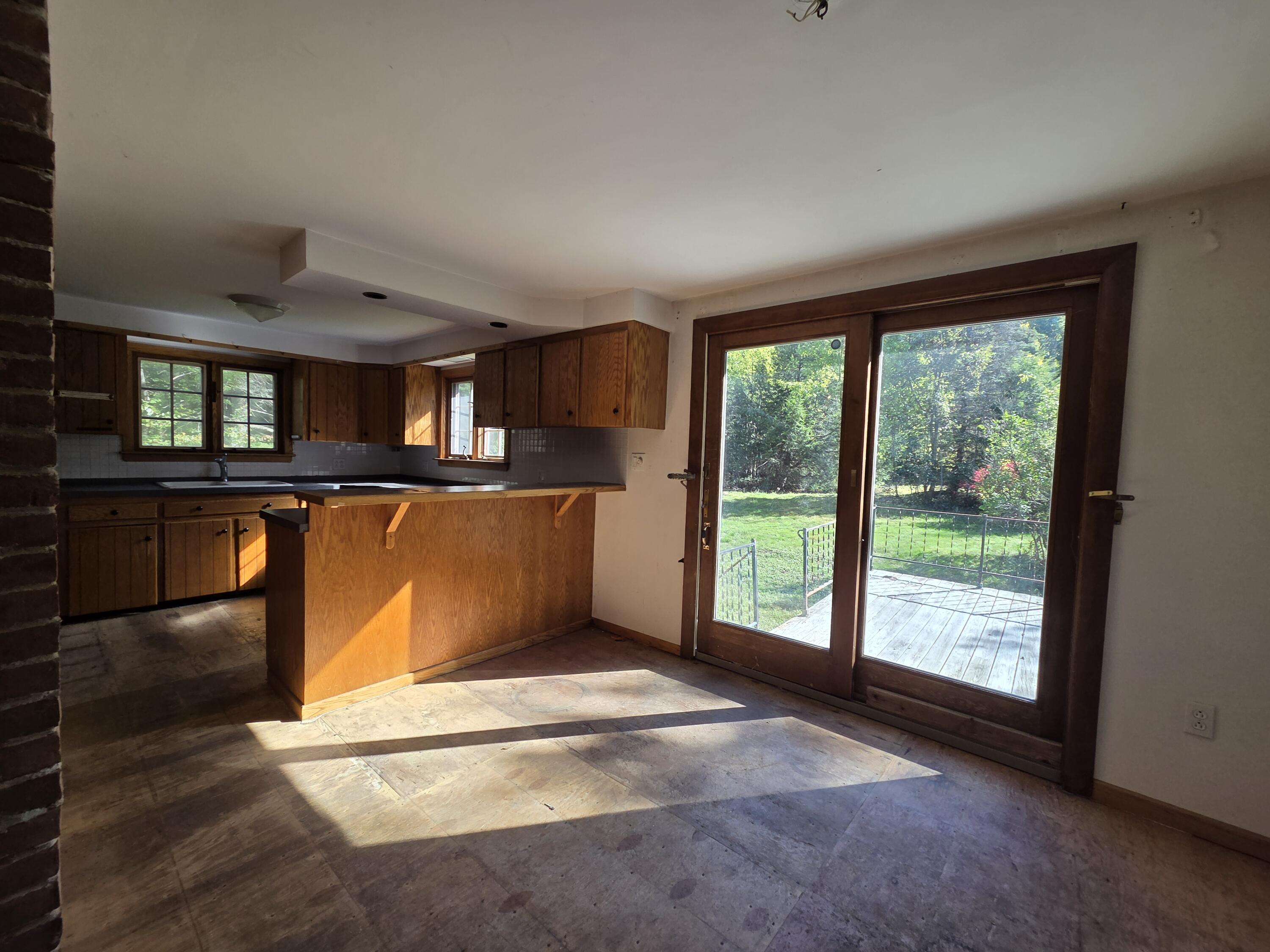 230 Ward Road Augusta, ME 04330 - Photo 5 of 38 Dining area and sliders to deck