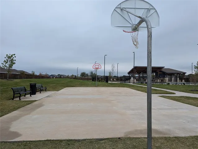 a view of swimming pool outdoor seating and mountain view