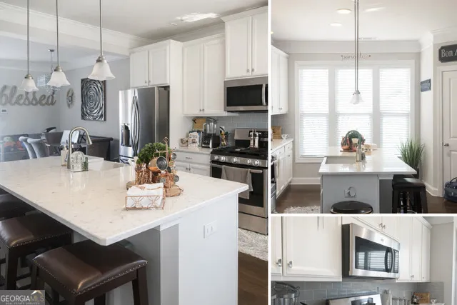 a kitchen with stainless steel appliances a sink a table and chairs