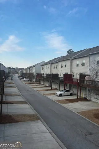 a view of a city street from a building