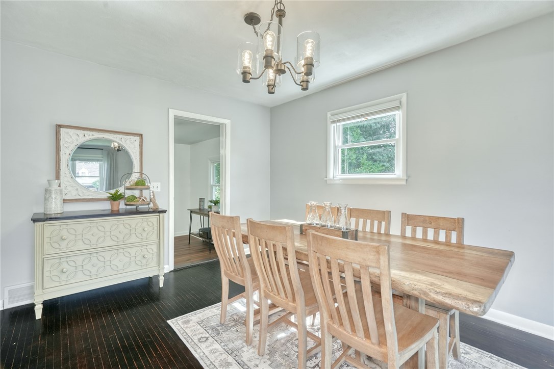 1038 Whalen Road Penfield, NY 14526 - Photo 9 of 46 Formal dining space with hardwood flooring