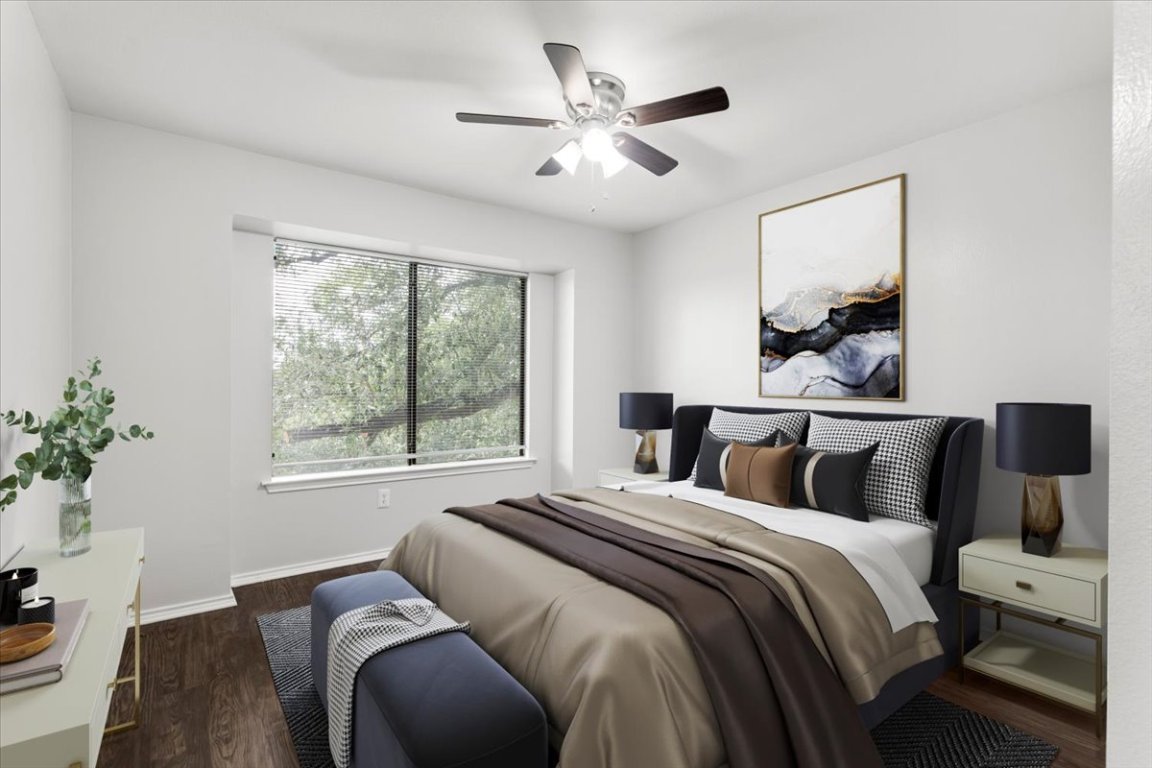 1740 Timber Ridge Road, Unit 132 Austin, TX 78741 - Photo 13 of 29 a bedroom with a large bed and a window