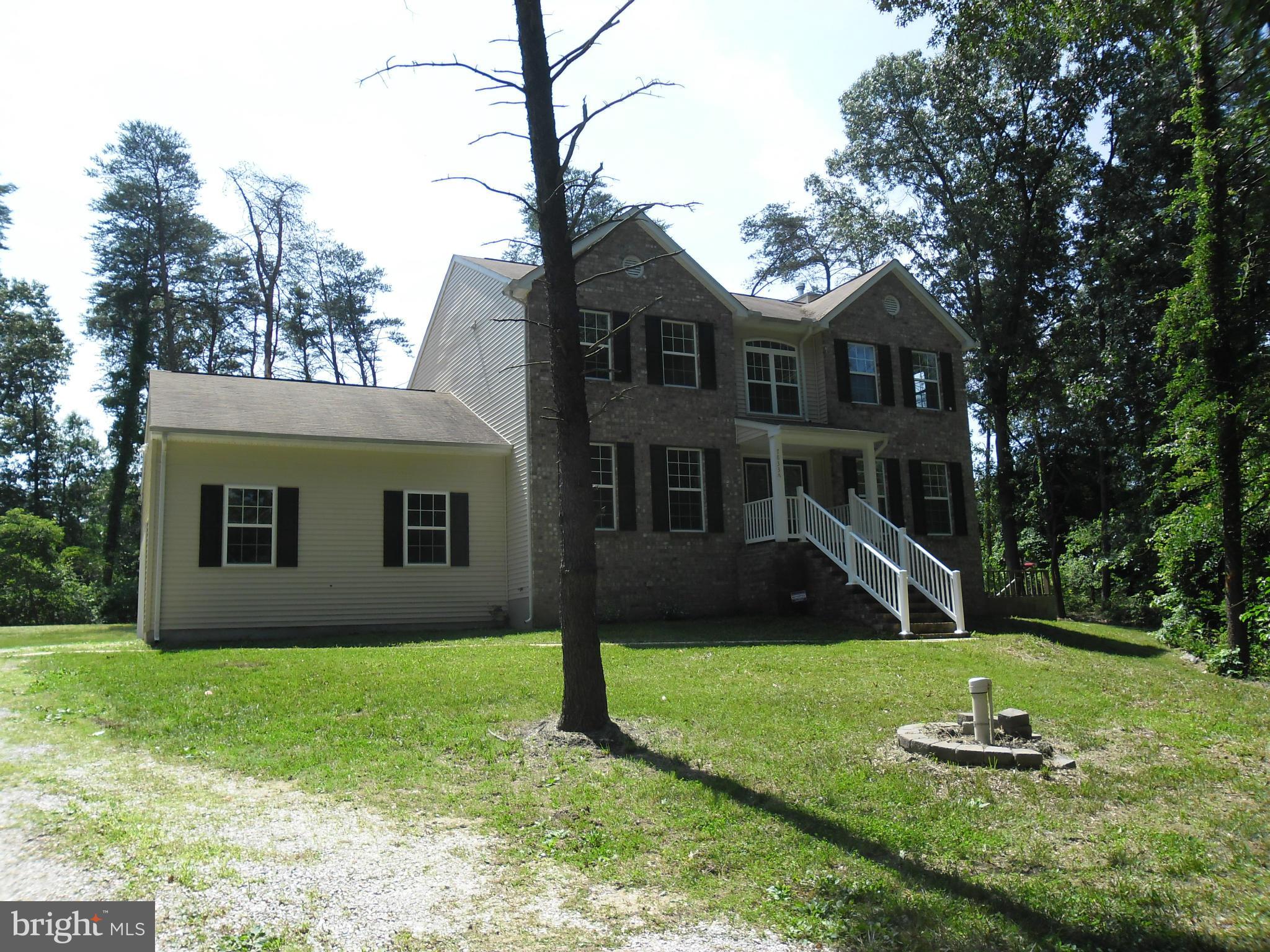 7833 Clark Station Road Severn, MD 21144 - Photo 1 of 30 a front view of a house with a yard