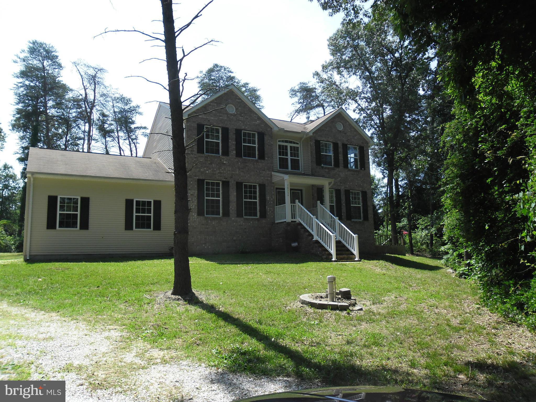 7833 Clark Station Road Severn, MD 21144 - Photo 2 of 30 a front view of a house with a yard
