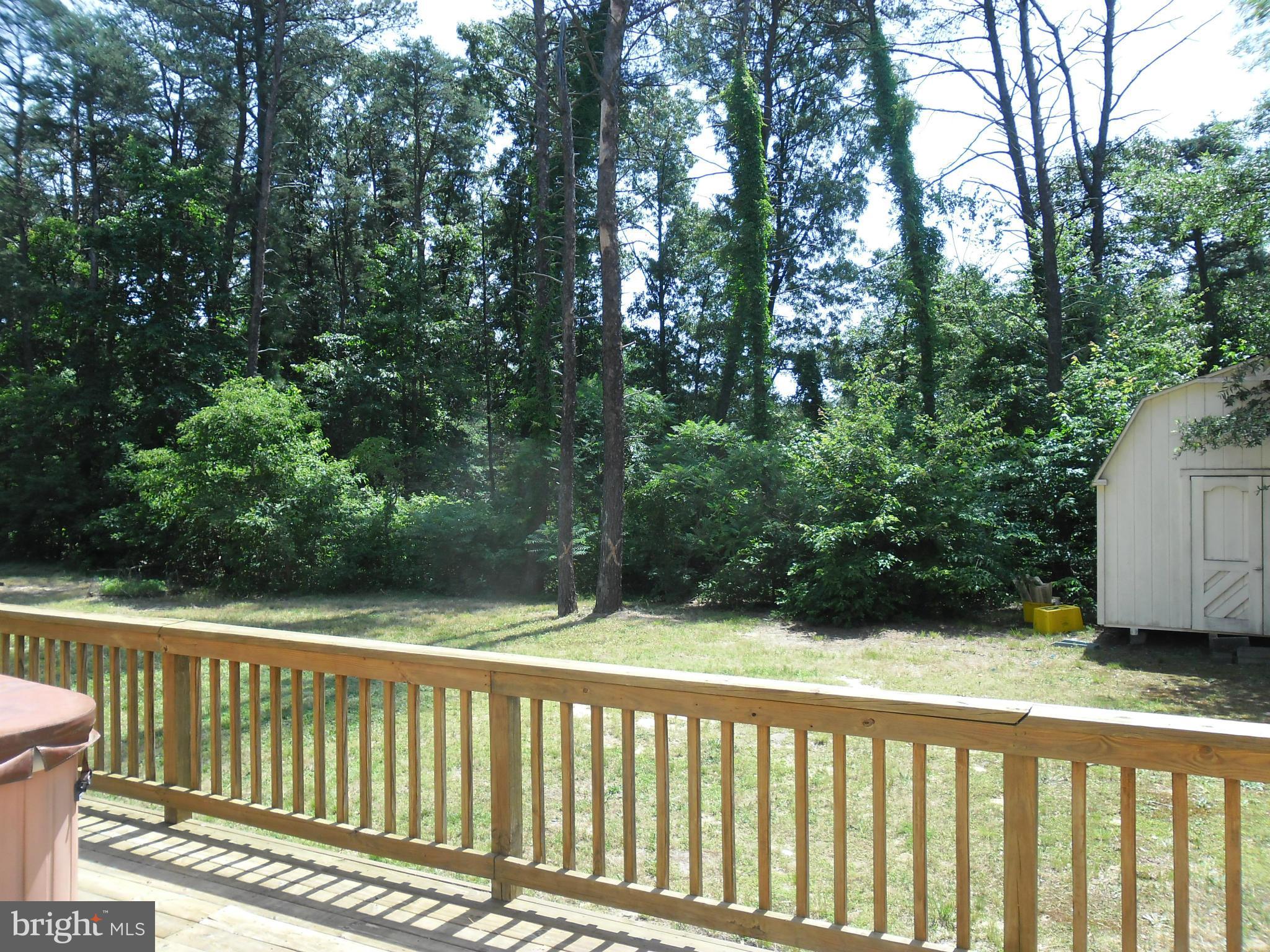 7833 Clark Station Road Severn, MD 21144 - Photo 11 of 30 a view of a wooden fence