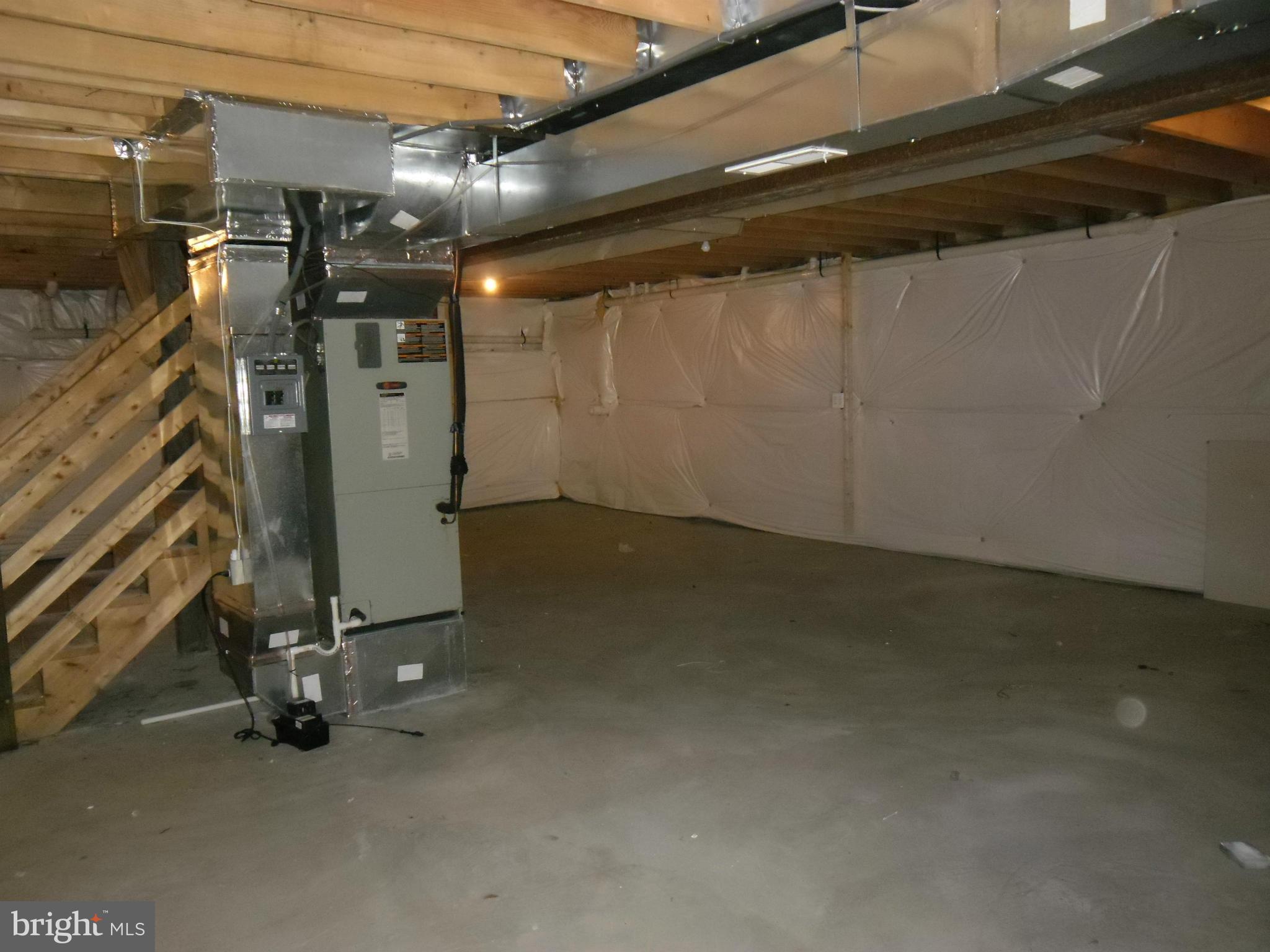 7833 Clark Station Road Severn, MD 21144 - Photo 27 of 30 a view of a room with gym equipment
