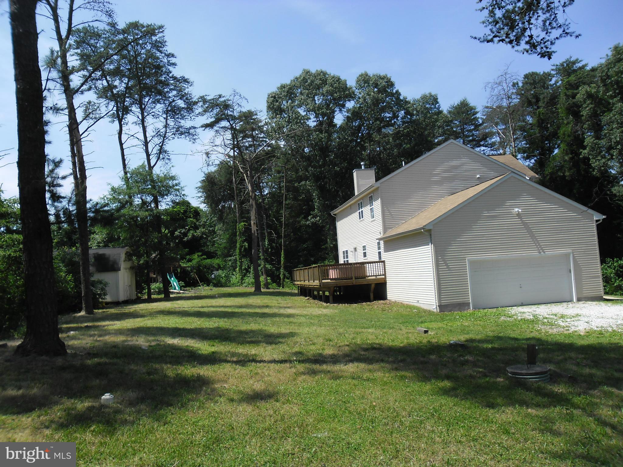 7833 Clark Station Road Severn, MD 21144 - Photo 29 of 30 a view of a house with a yard