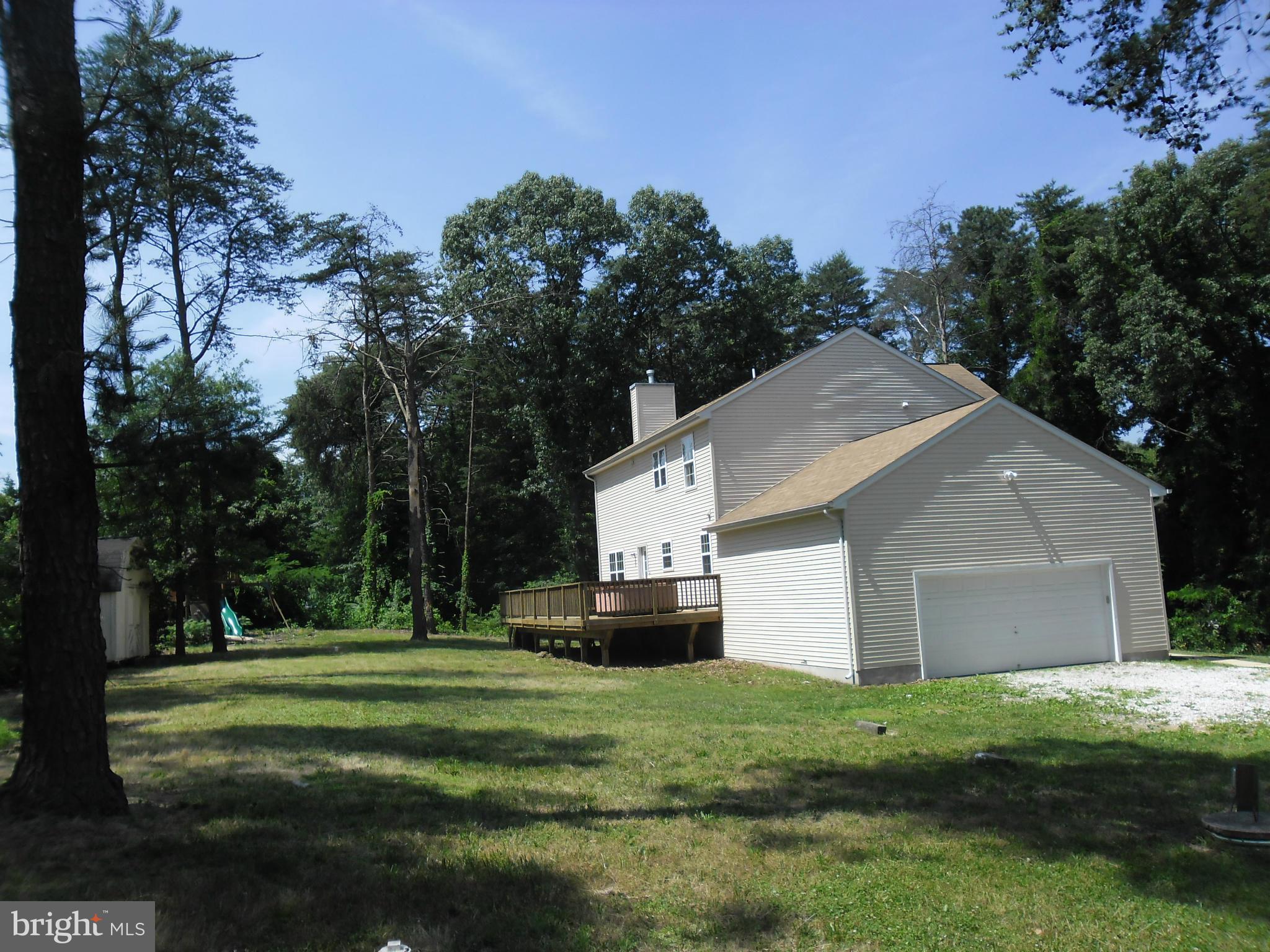 7833 Clark Station Road Severn, MD 21144 - Photo 4 of 30 a front view of house with yard and trees