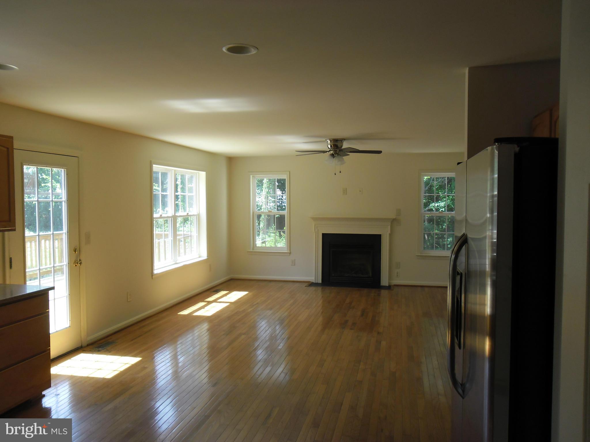 7833 Clark Station Road Severn, MD 21144 - Photo 9 of 30 a view of empty room with a fireplace