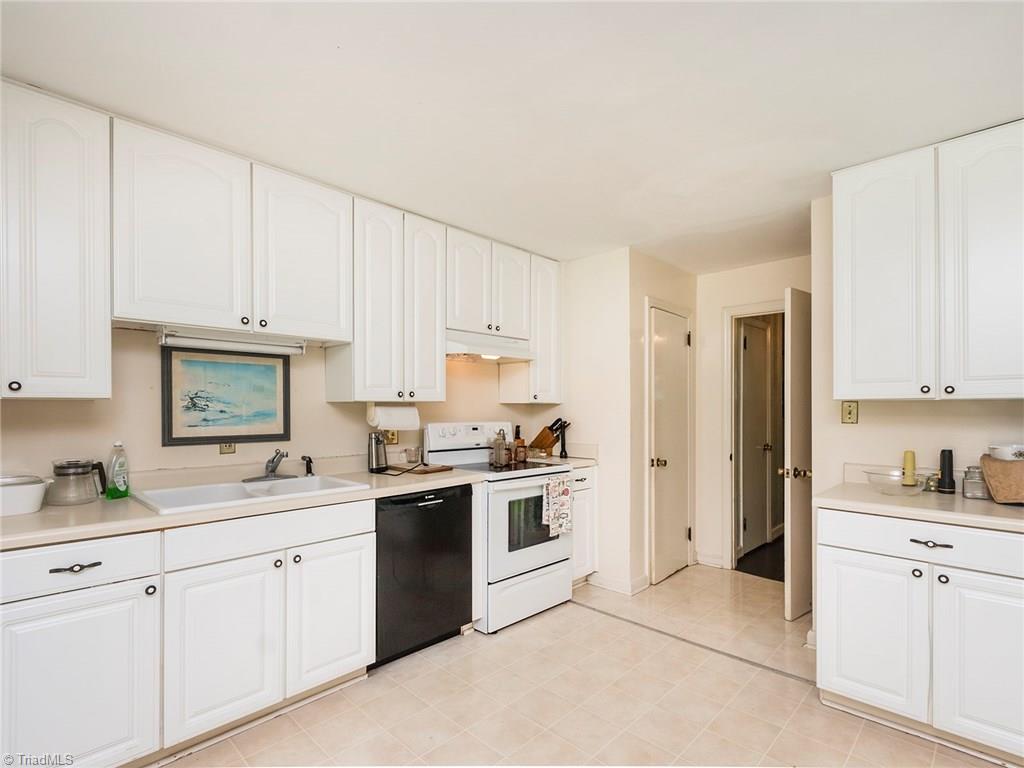 1812 Neelley Road Pleasant Garden, NC 27313 - Photo 5 of 26 The kitchen offers so much cabinet space!! There is also a utility closet and pantry!