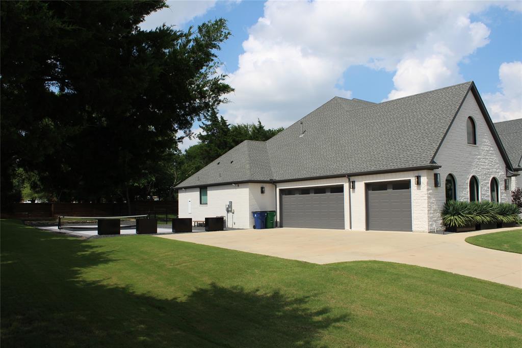 333 Renaissance Lane Heath, TX 75032 - Photo 3 of 35 Driveway on side of house
