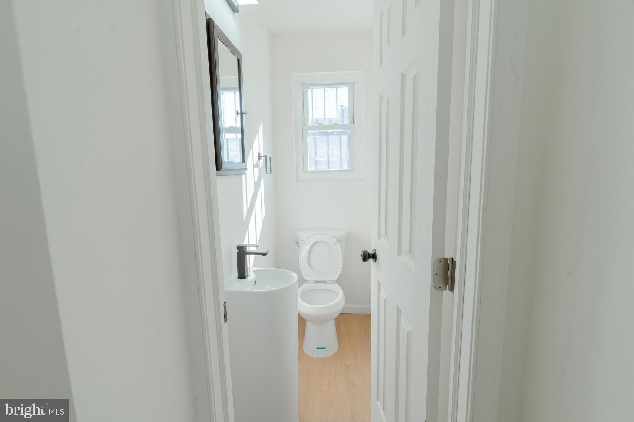 413 Kennedy Street Northeast Washington, DC 20011 - Photo 12 of 16 a bathroom with a toilet