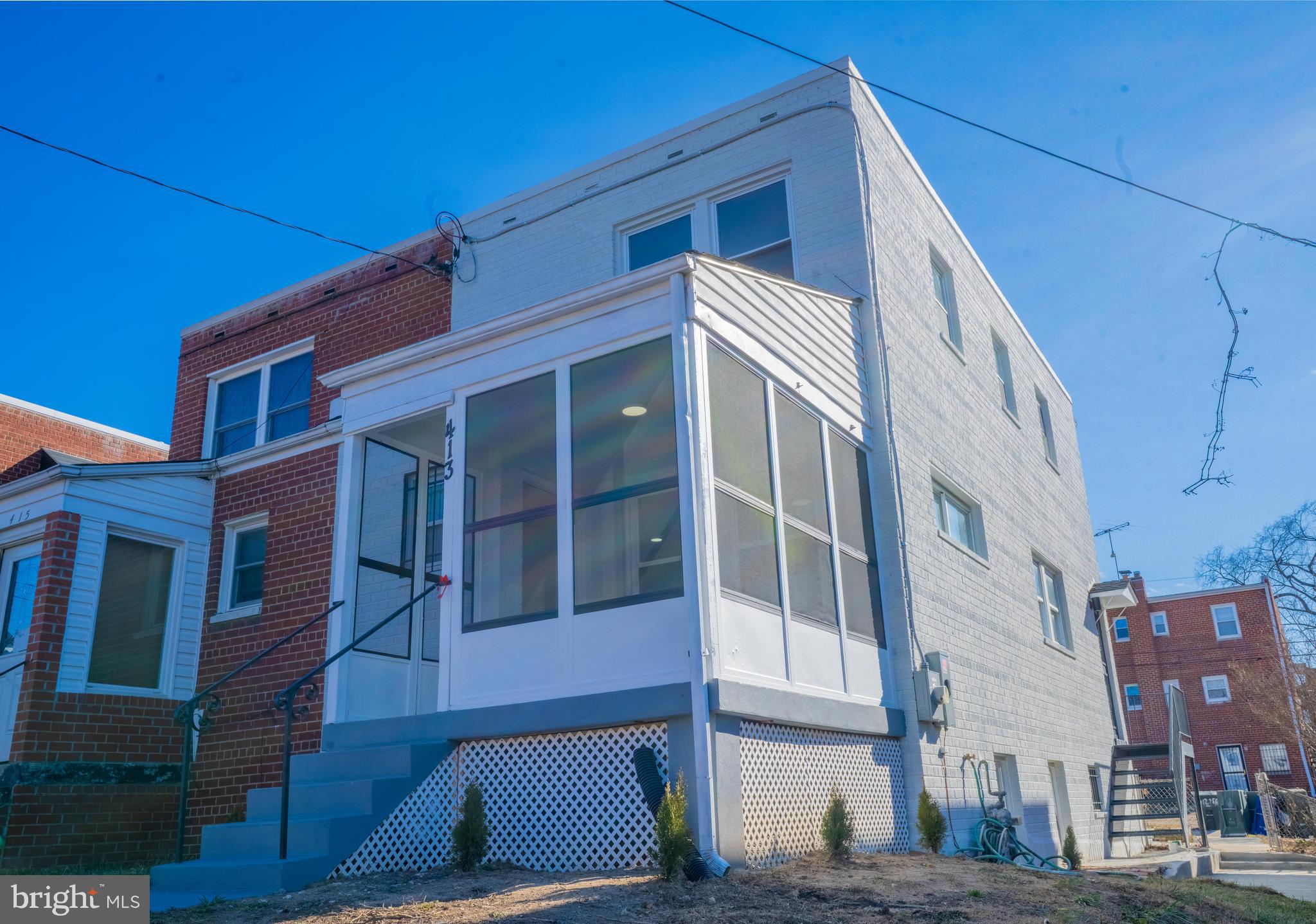 413 Kennedy Street Northeast Washington, DC 20011 - Photo 6 of 16 a view of a building with a street