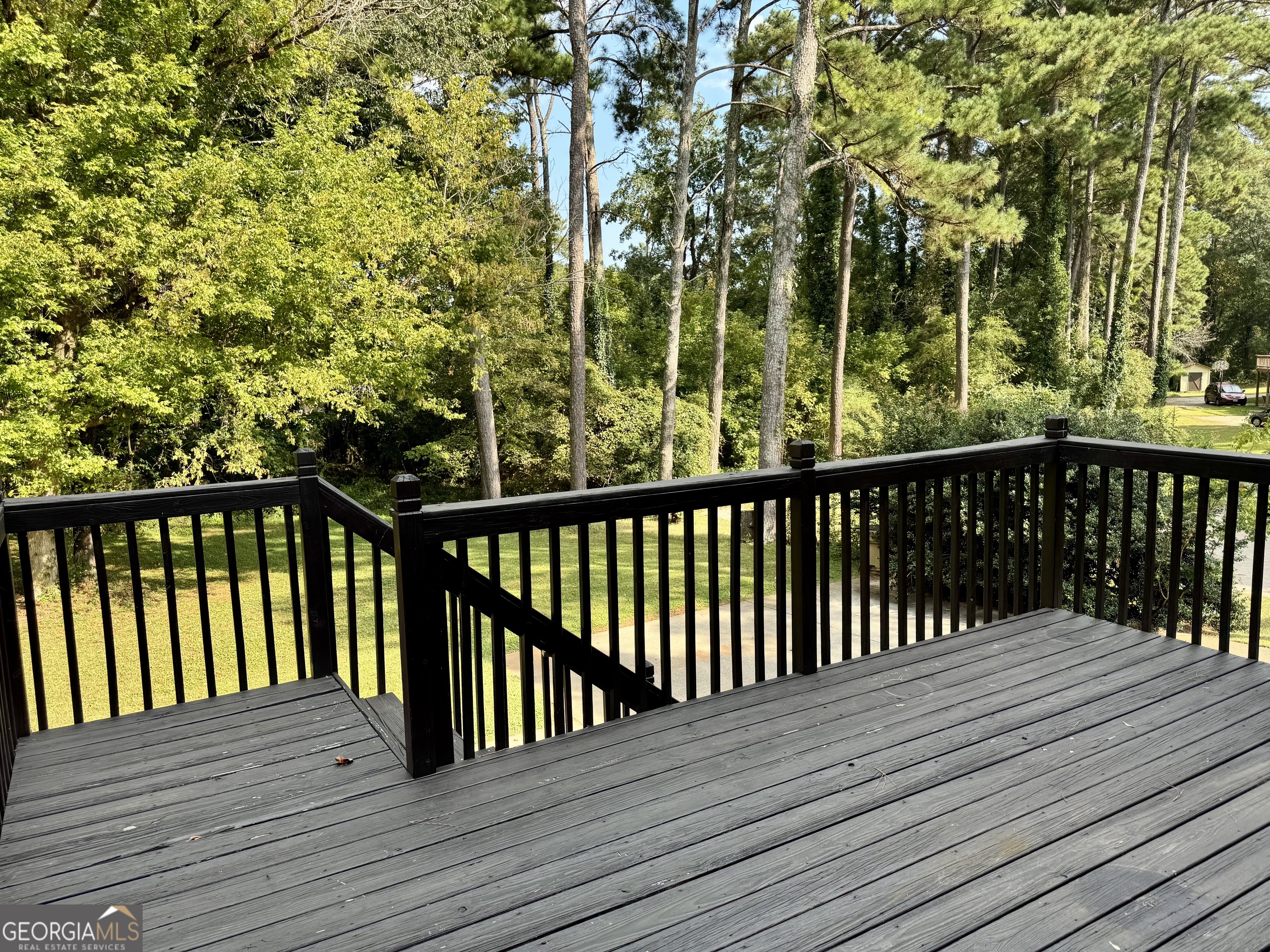 19 Sentry Oak Court, Unit B Stockbridge, GA 30281 - Photo 11 of 14 a view of balcony with wooden floor