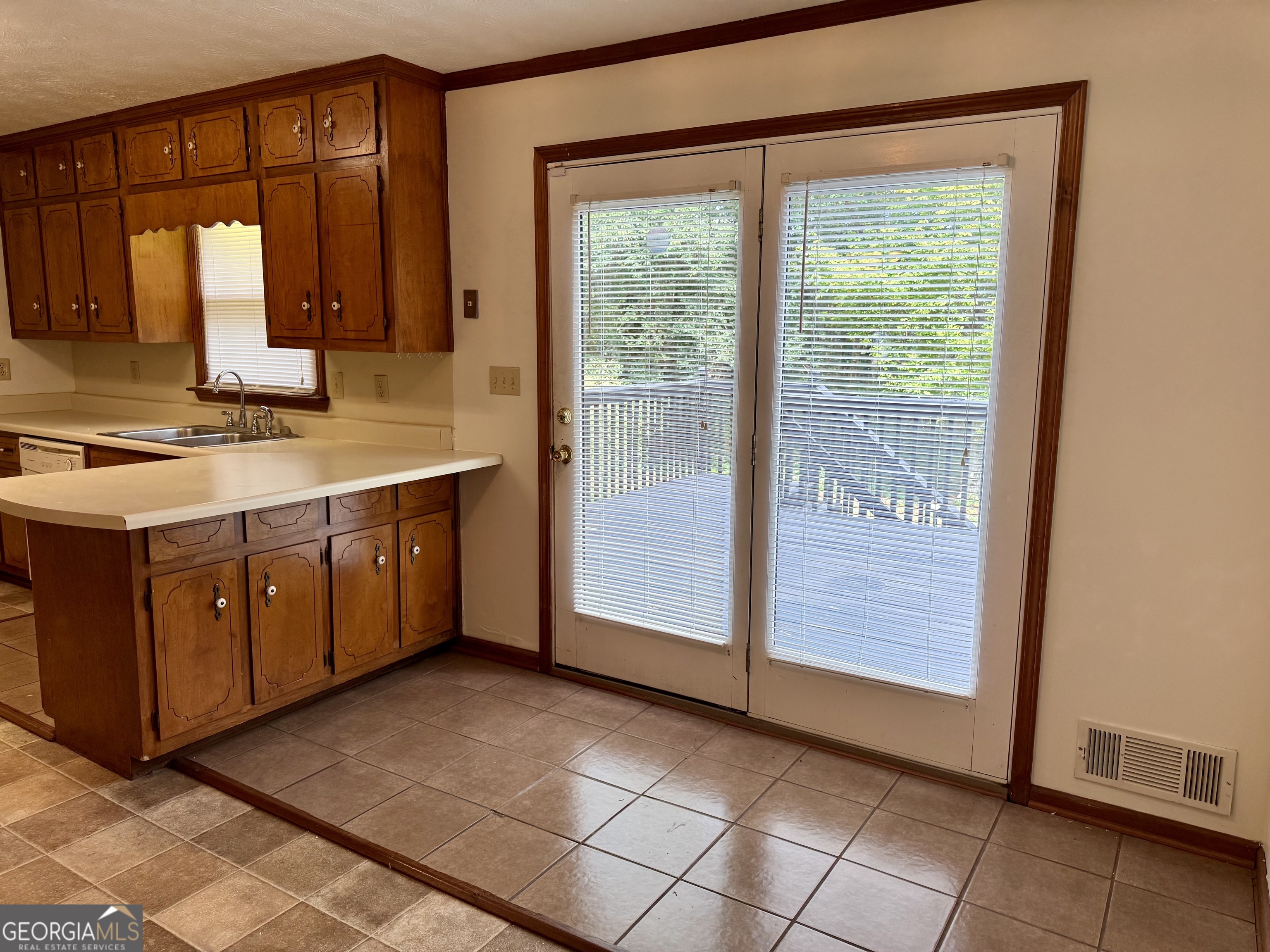 19 Sentry Oak Court, Unit B Stockbridge, GA 30281 - Photo 13 of 14 a view of a kitchen with a sink