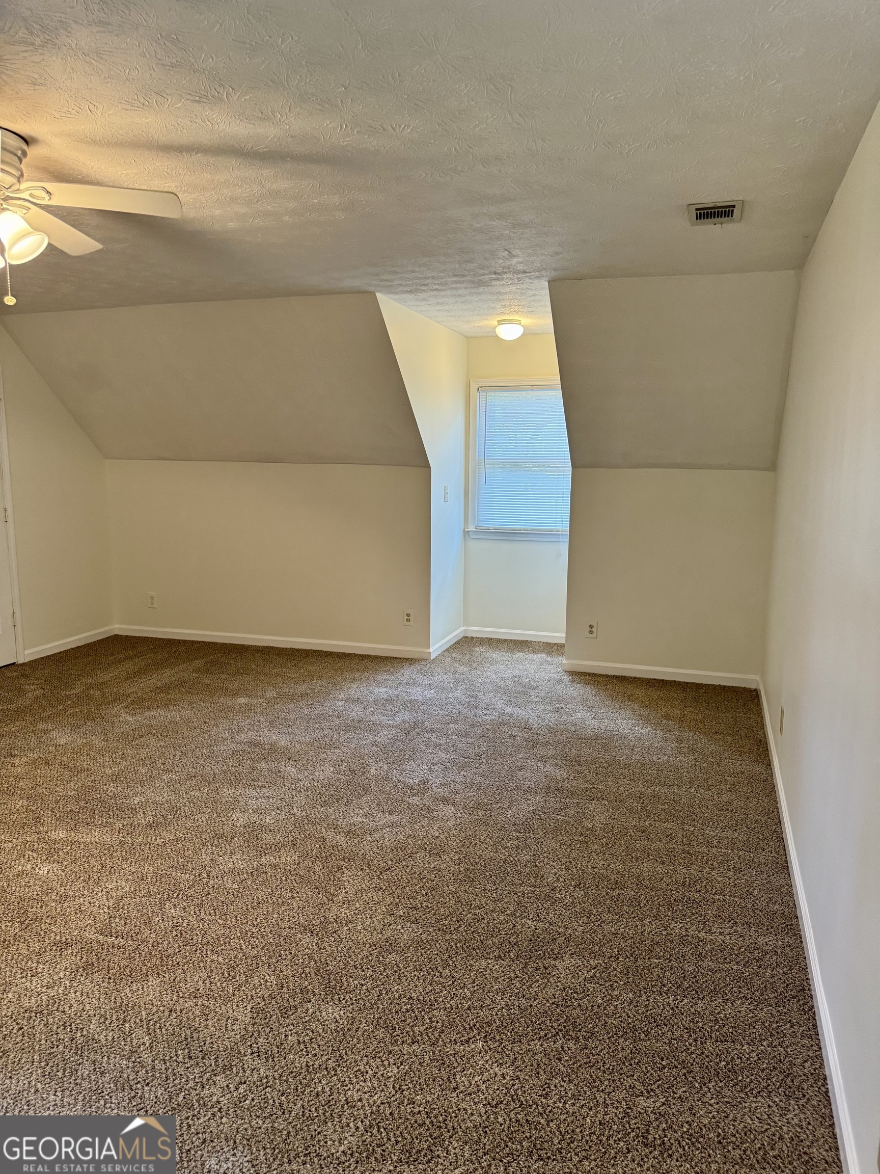 19 Sentry Oak Court, Unit B Stockbridge, GA 30281 - Photo 6 of 14 a view of empty room