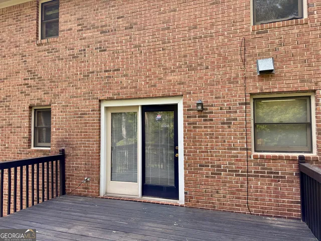 a view of front door of house and front door