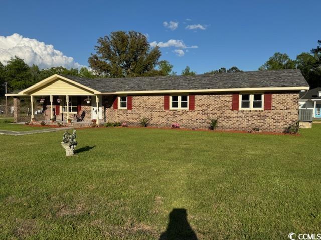 538 County Rd S-22-537 Georgetown, SC 29440 - Photo 2 of 36 Single story home with a front yard
