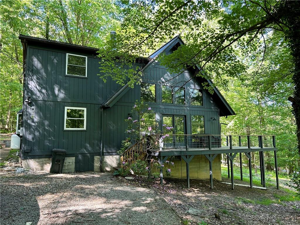 240 Birch Road Acme, PA 15610 - Photo 1 of 44 a view of front of house with a yard
