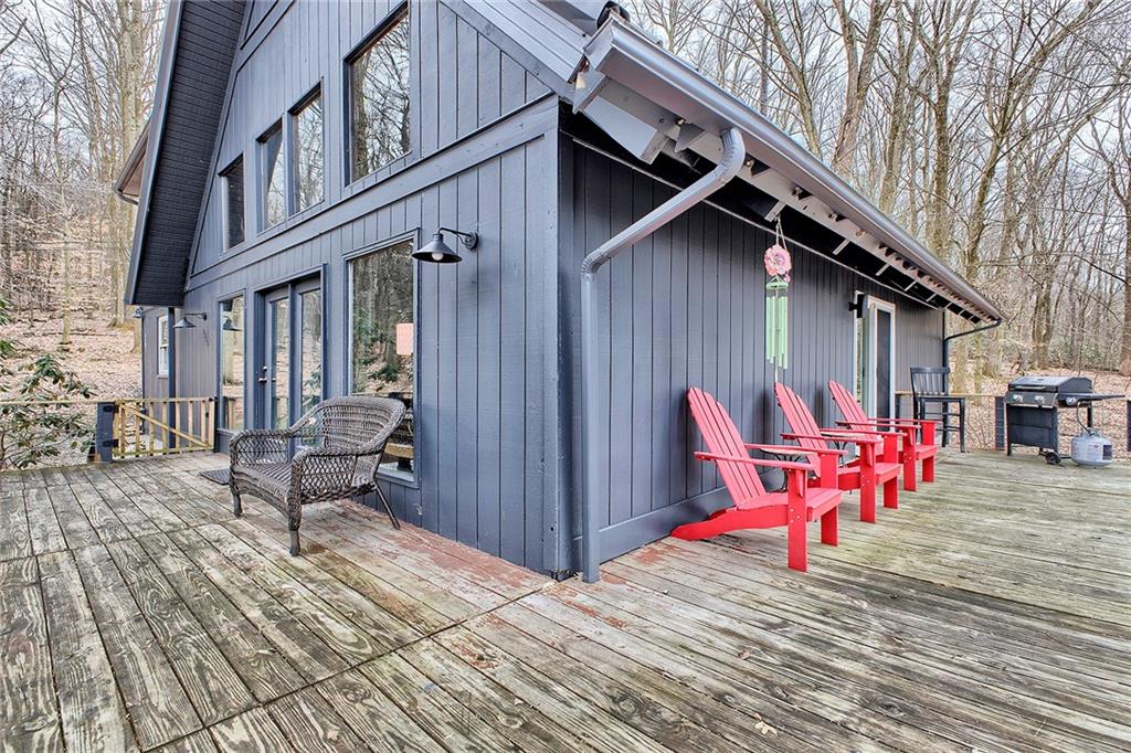 240 Birch Road Acme, PA 15610 - Photo 33 of 44 a backyard of a house with seating space