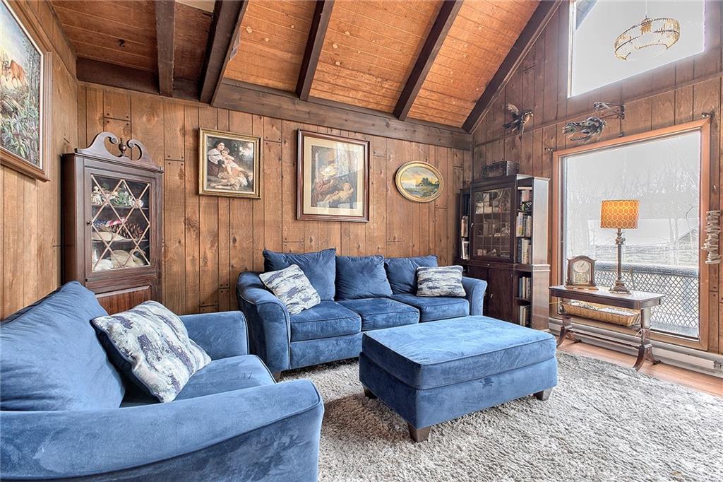 240 Birch Road Acme, PA 15610 - Photo 5 of 44 a living room with furniture and a window
