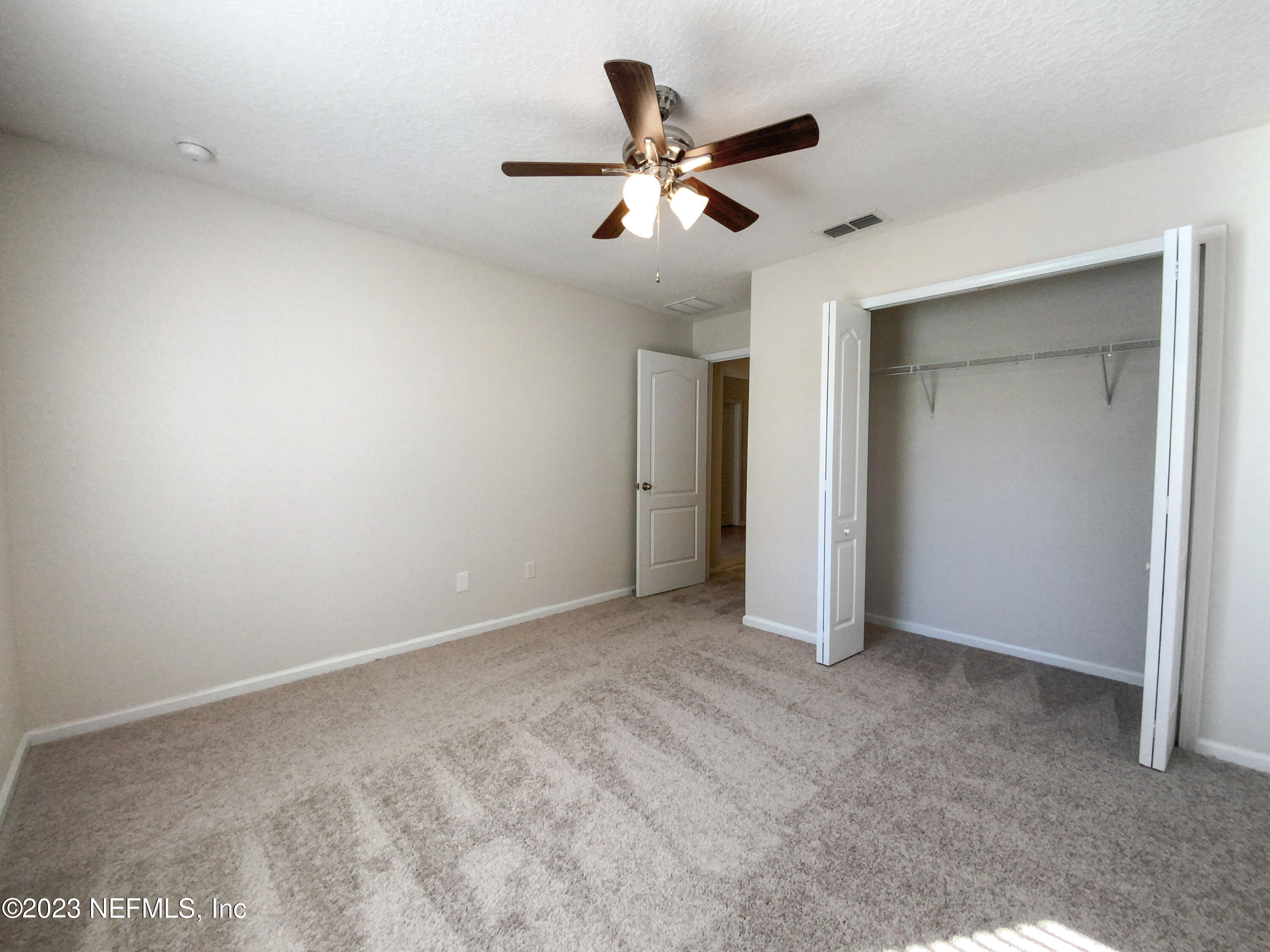56 Irish Rose Road St. Augustine, FL 32092 - Photo 11 of 25 a view of an empty room