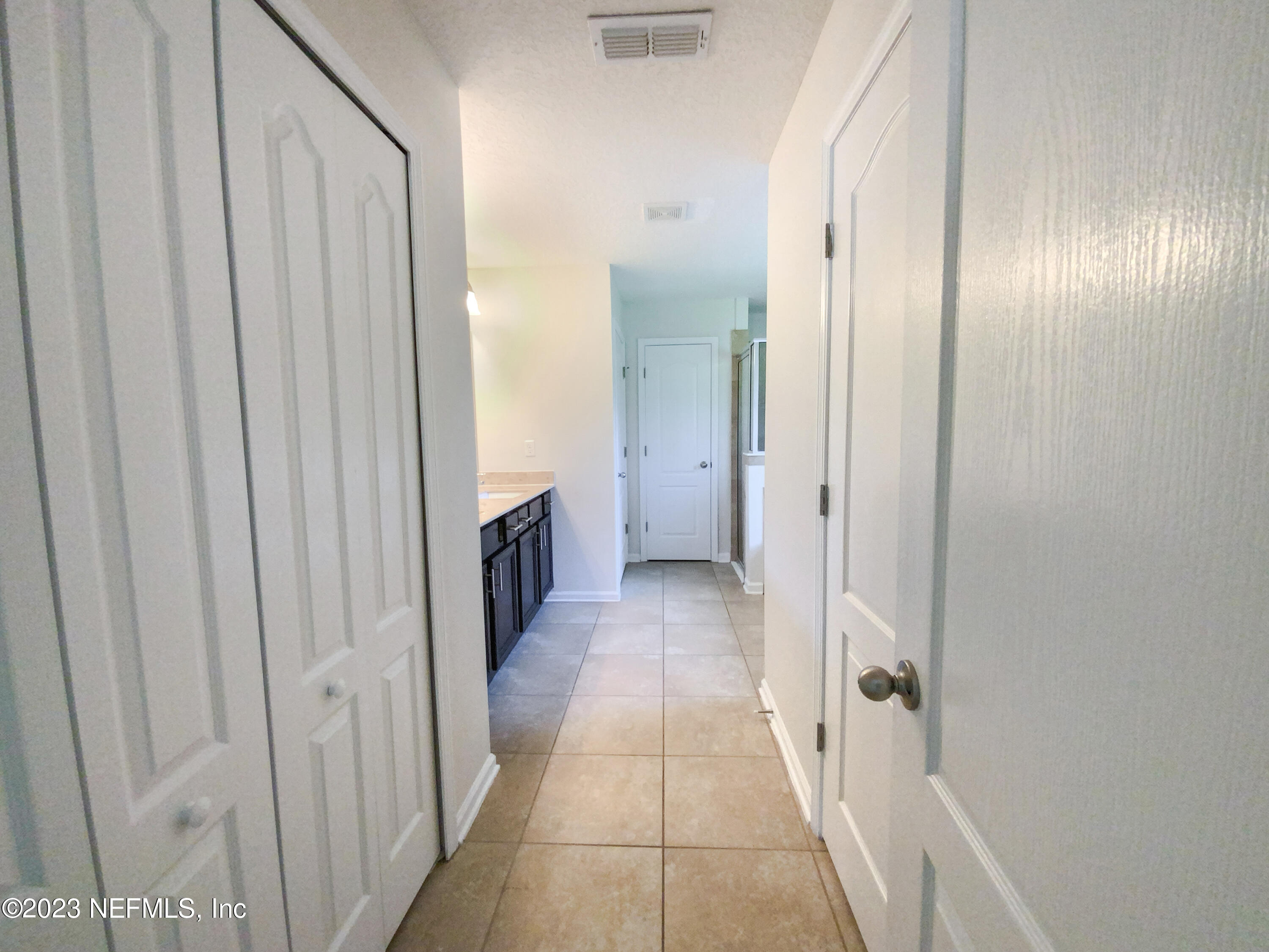 56 Irish Rose Road St. Augustine, FL 32092 - Photo 19 of 25 a view of a hallway with wooden floor
