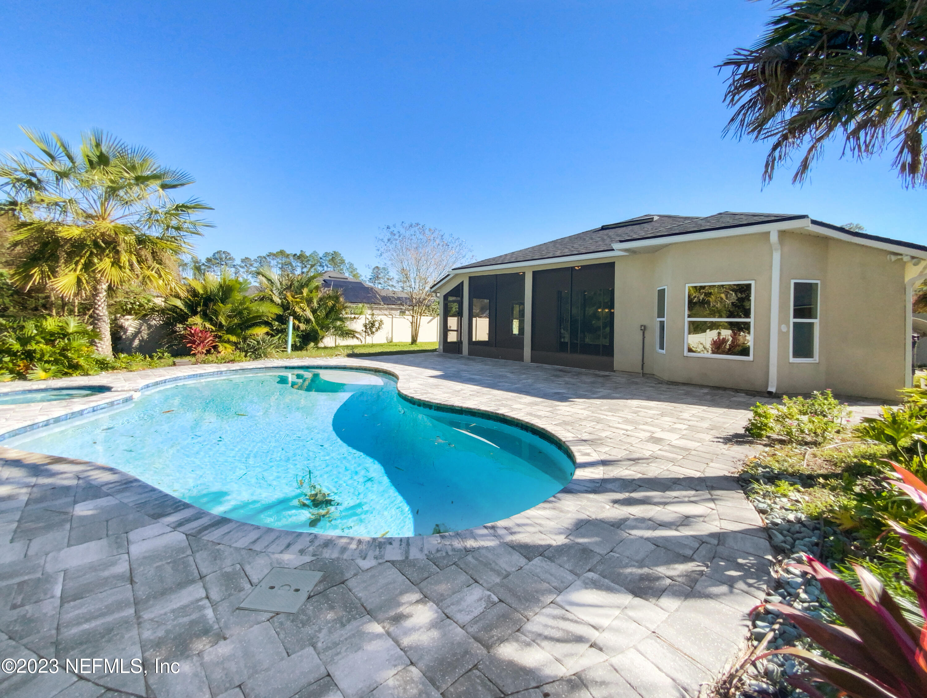 56 Irish Rose Road St. Augustine, FL 32092 - Photo 23 of 25 a view of a house with a swimming pool