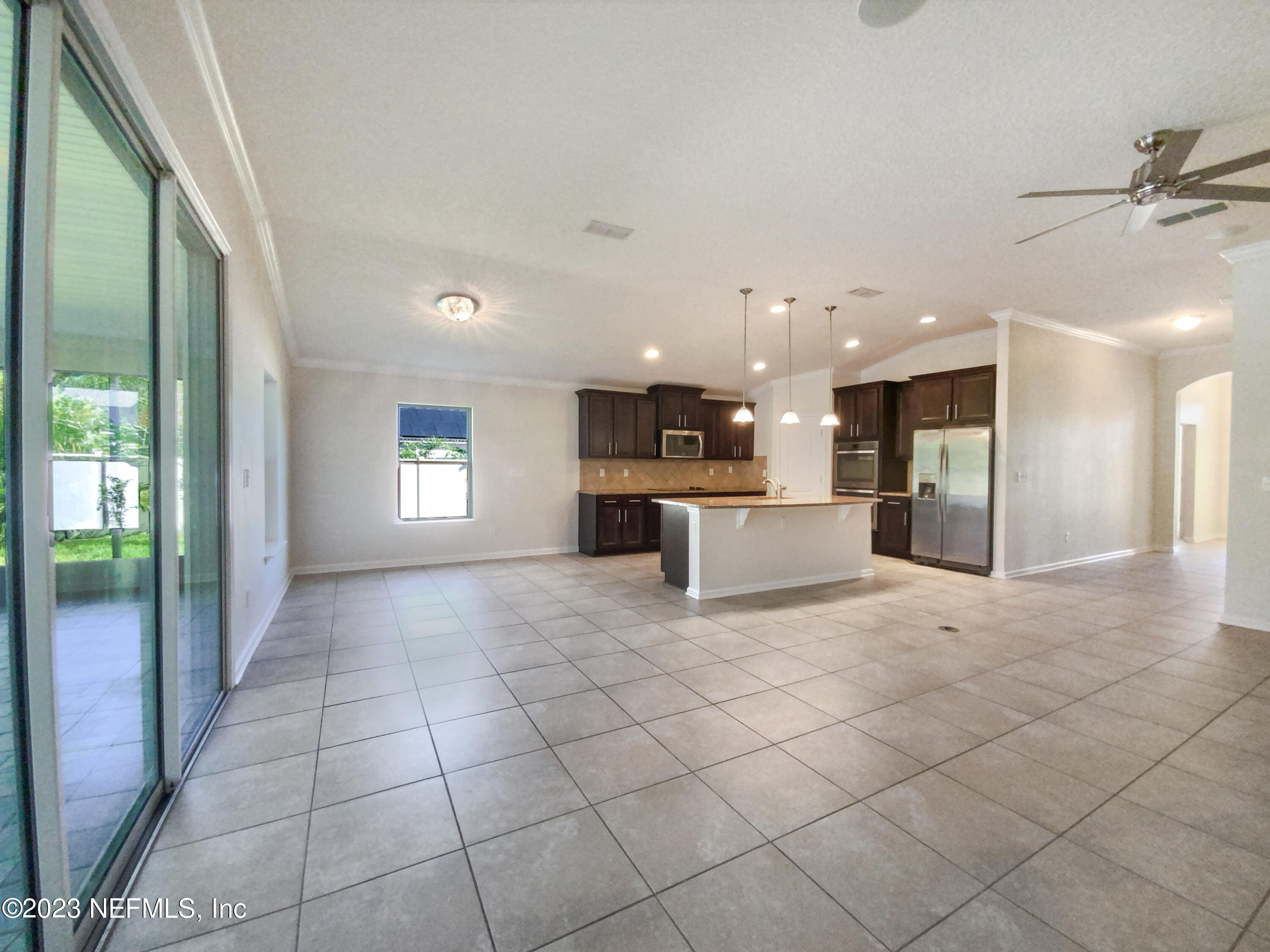 56 Irish Rose Road St. Augustine, FL 32092 - Photo 9 of 25 a view of a kitchen with a sink and a stove top oven