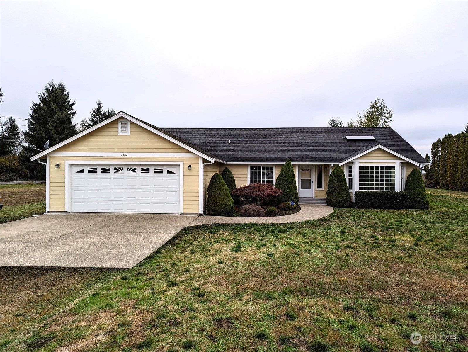 7132 183rd Avenue Southwest Rochester, WA 98579 - Photo 4 of 40 a view of front of house with a yard