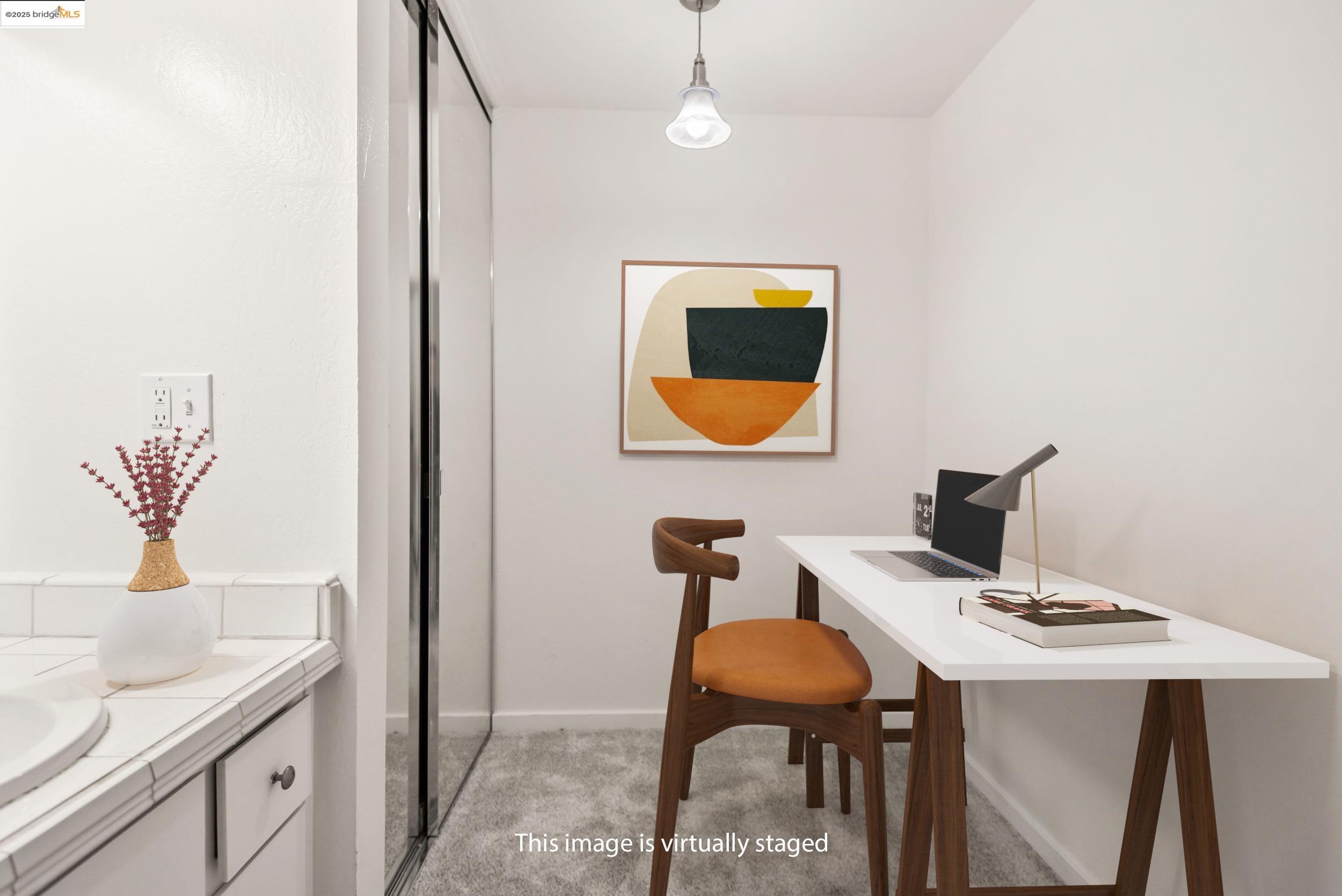 288 Whitmore Street, Unit 310B Oakland, CA 94611 - Photo 17 of 37 a view of a workspace with furniture