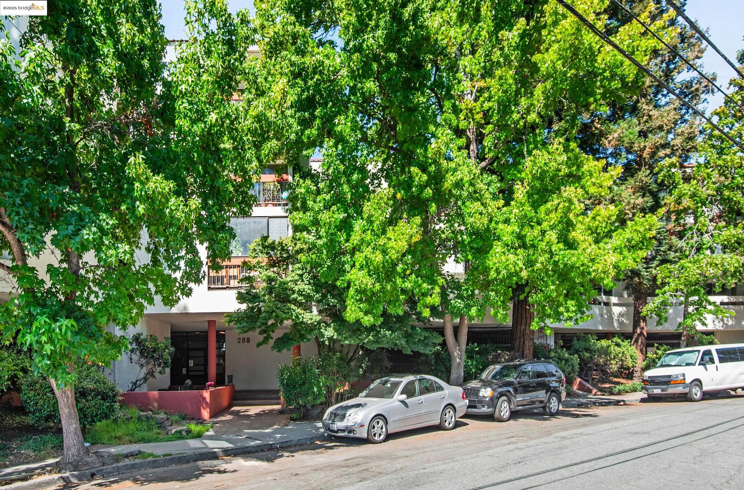 288 Whitmore Street, Unit 310B Oakland, CA 94611 - Photo 28 of 37 a car parked in front of a house