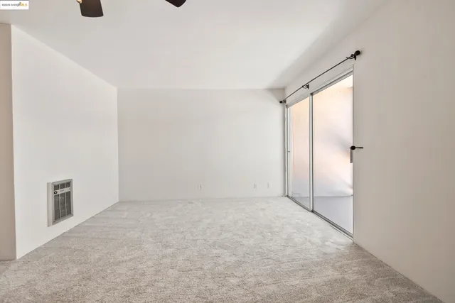 an empty room with a natural light