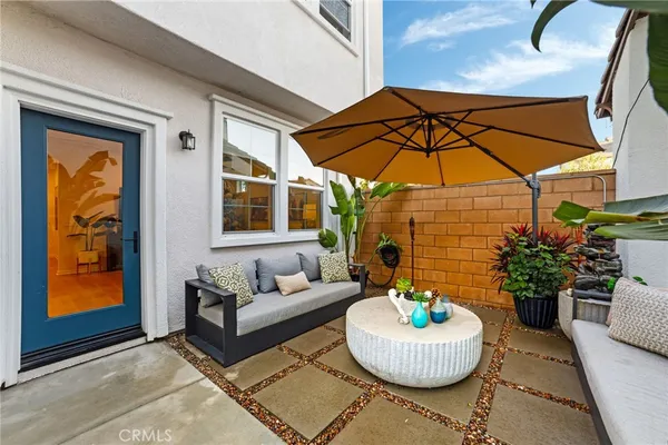 a sink and a tub sitting in front of a house
