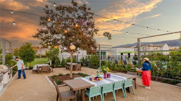 a view of house and outdoor space with swimming pool