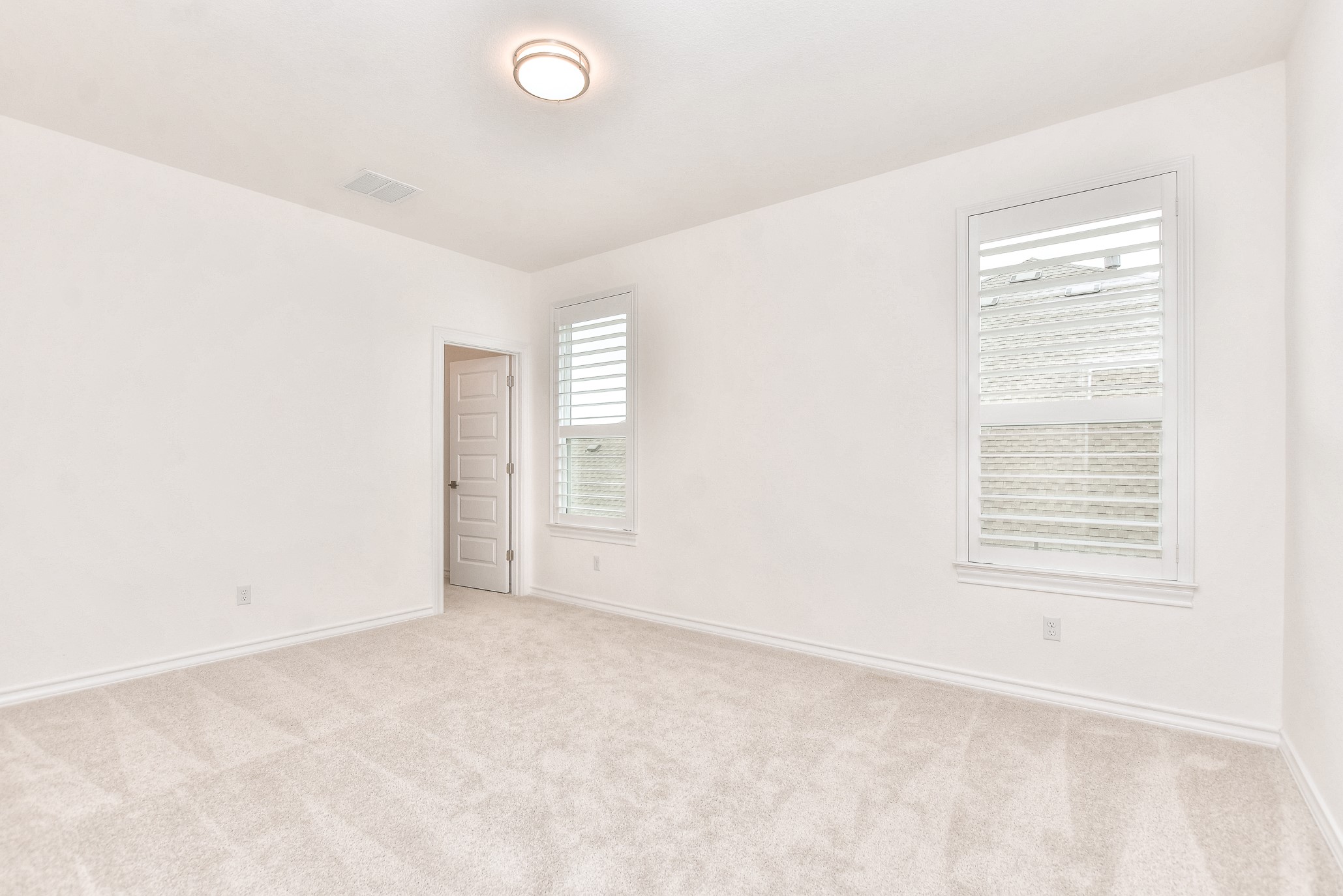 309 Wolf Rdg Road Georgetown, TX 78628 - Photo 29 of 39 Unfurnished room featuring light carpet and baseboards