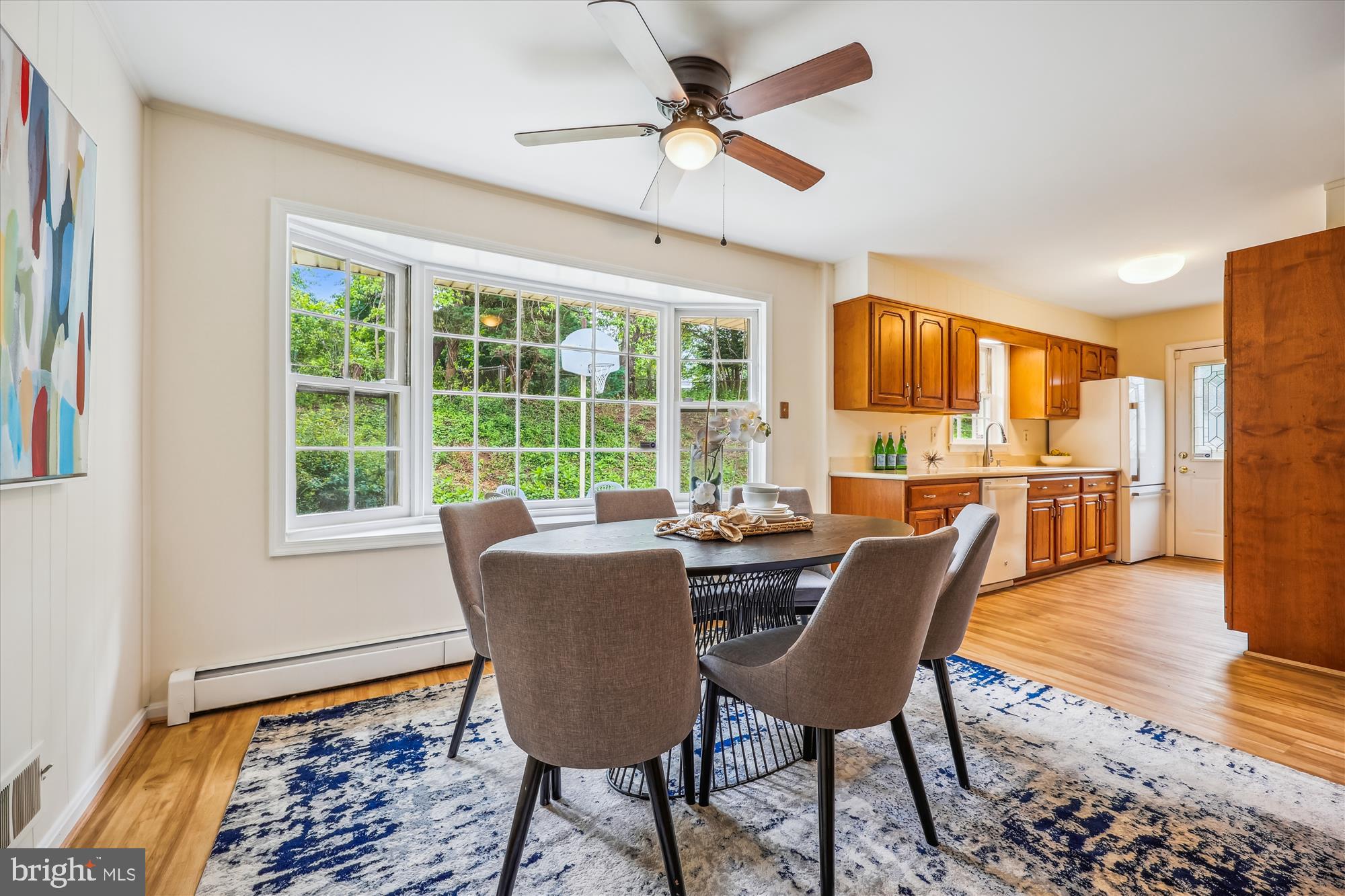 1029 Tracy Drive Silver Spring, MD 20904 - Photo 17 of 59 a dining room with furniture a window and wooden floor