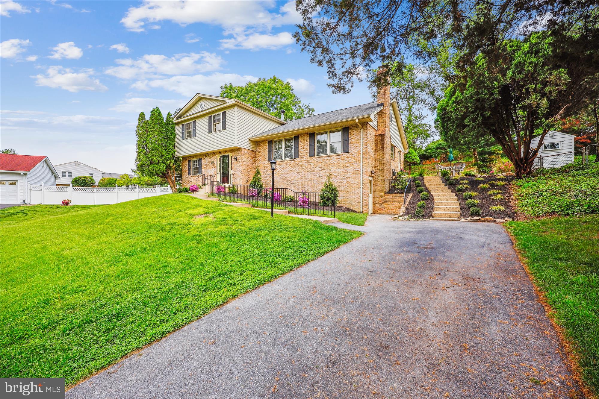 1029 Tracy Drive Silver Spring, MD 20904 - Photo 2 of 59 a view of house with a big yard and potted plants