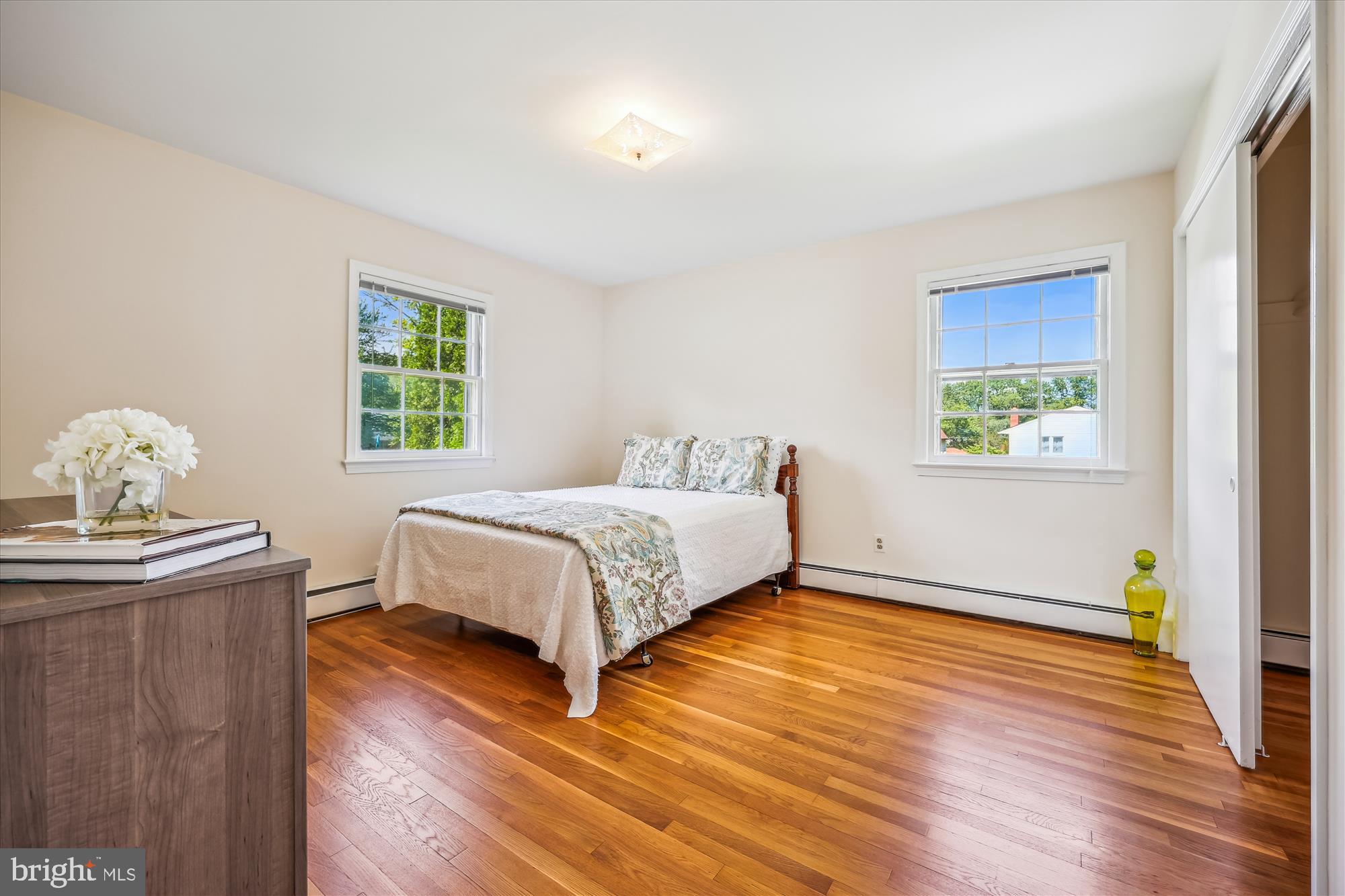 1029 Tracy Drive Silver Spring, MD 20904 - Photo 39 of 59 a bedroom with a bed and wooden floor