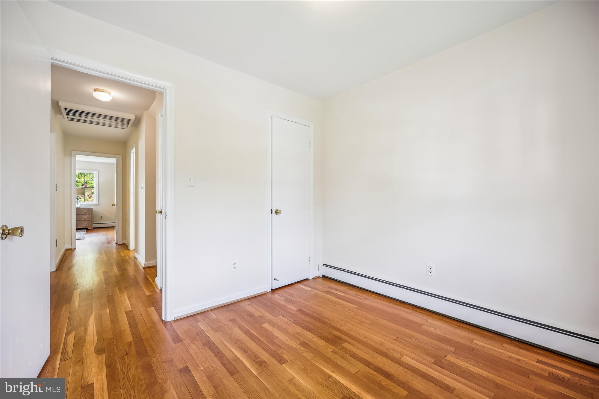 1029 Tracy Drive Silver Spring, MD 20904 - Photo 44 of 59 a view of a room with wooden floor and a bathroom