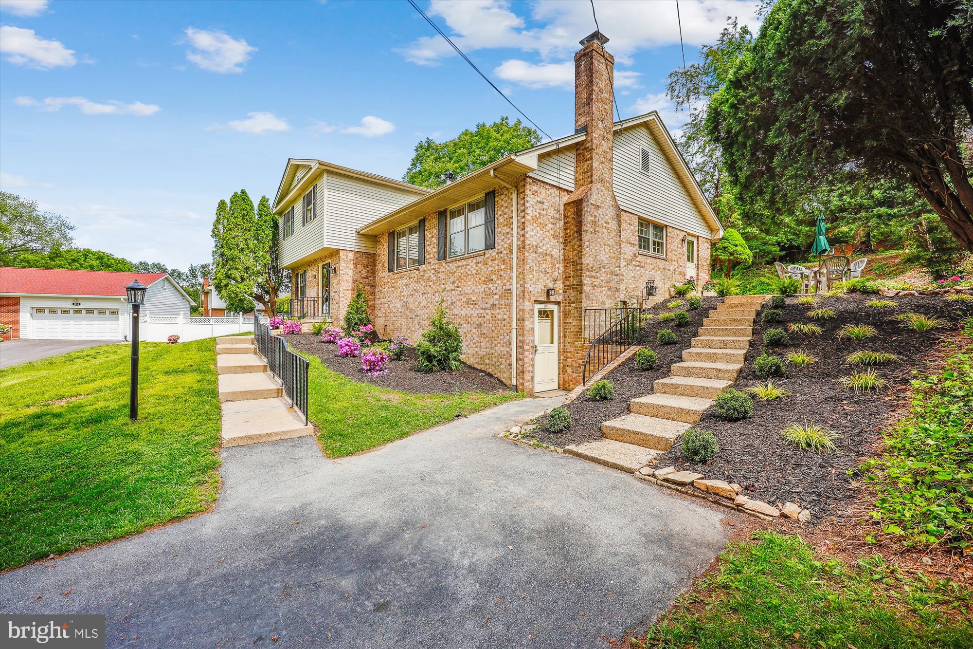 1029 Tracy Drive Silver Spring, MD 20904 - Photo 50 of 59 a view of a house with a yard and pathway