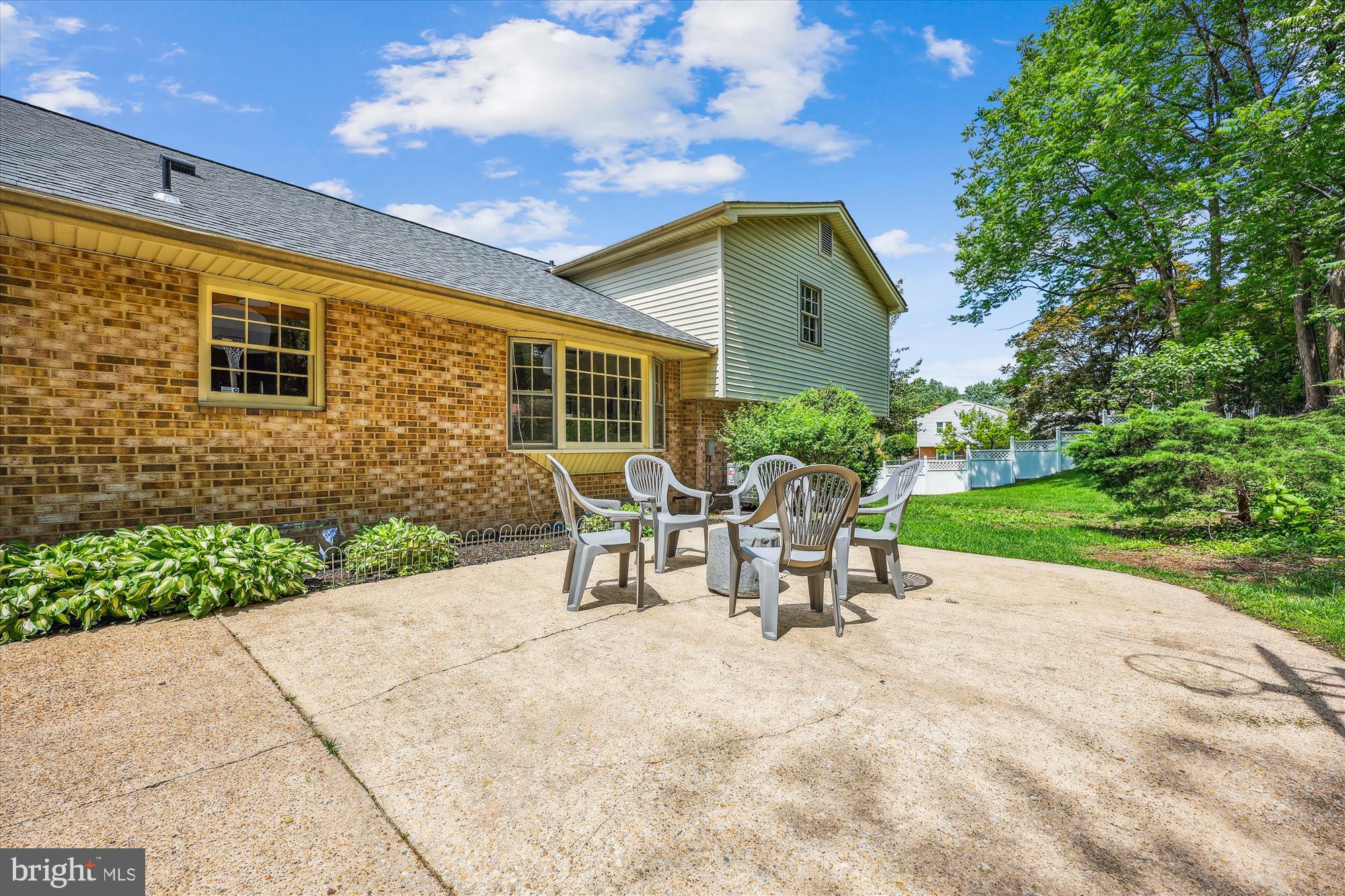 1029 Tracy Drive Silver Spring, MD 20904 - Photo 53 of 59 a view of a patio with a table and chairs