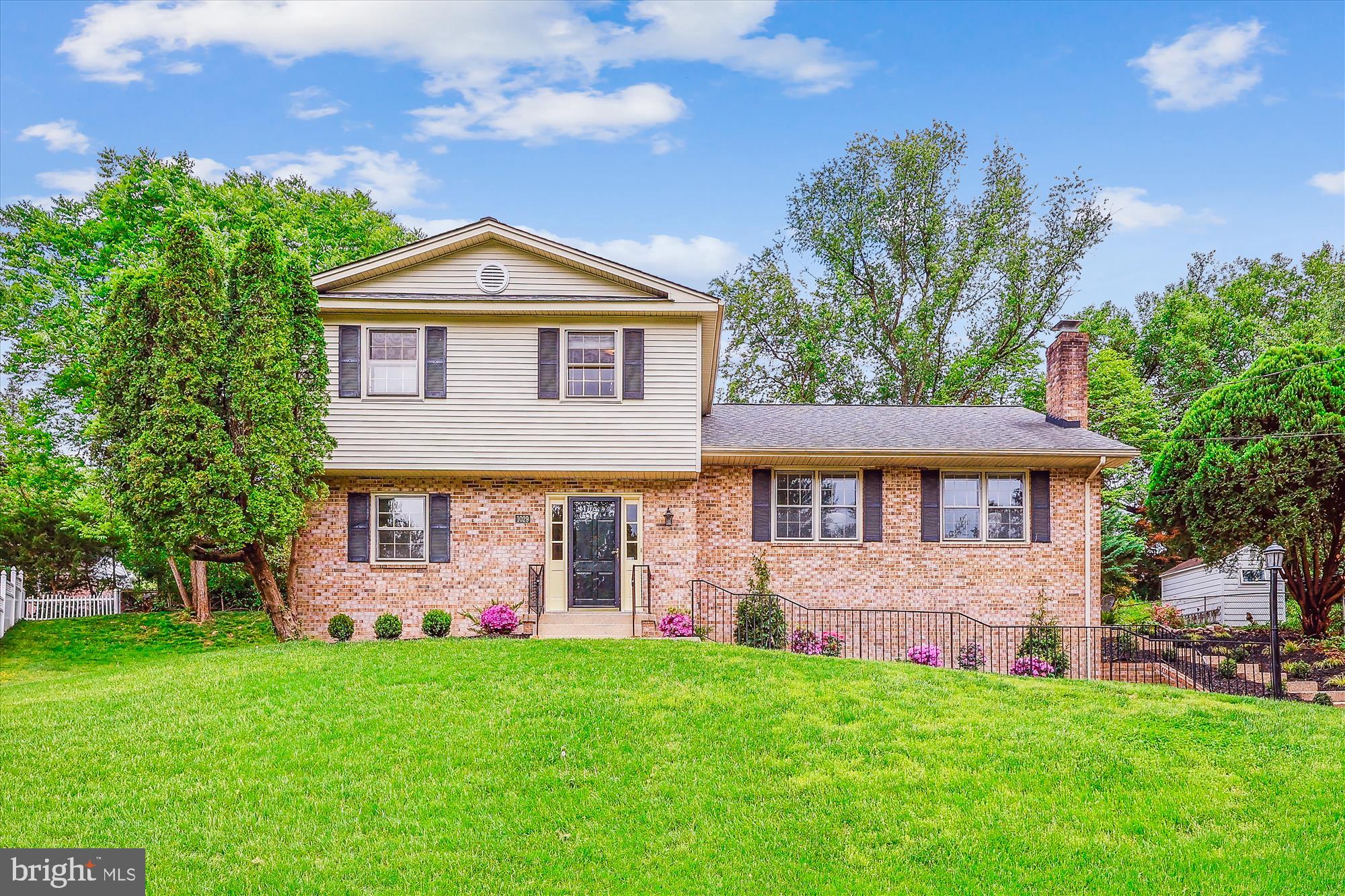 1029 Tracy Drive Silver Spring, MD 20904 - Photo 55 of 59 a front view of a house with a garden
