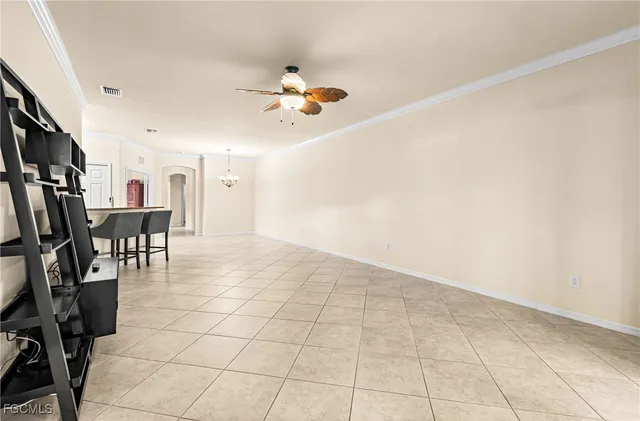 a view of a hallway view with wooden floor and windows