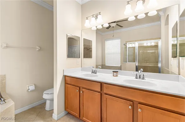 a bathroom with a tub and a shower