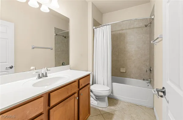 a view of a bathroom with a glass door and shower