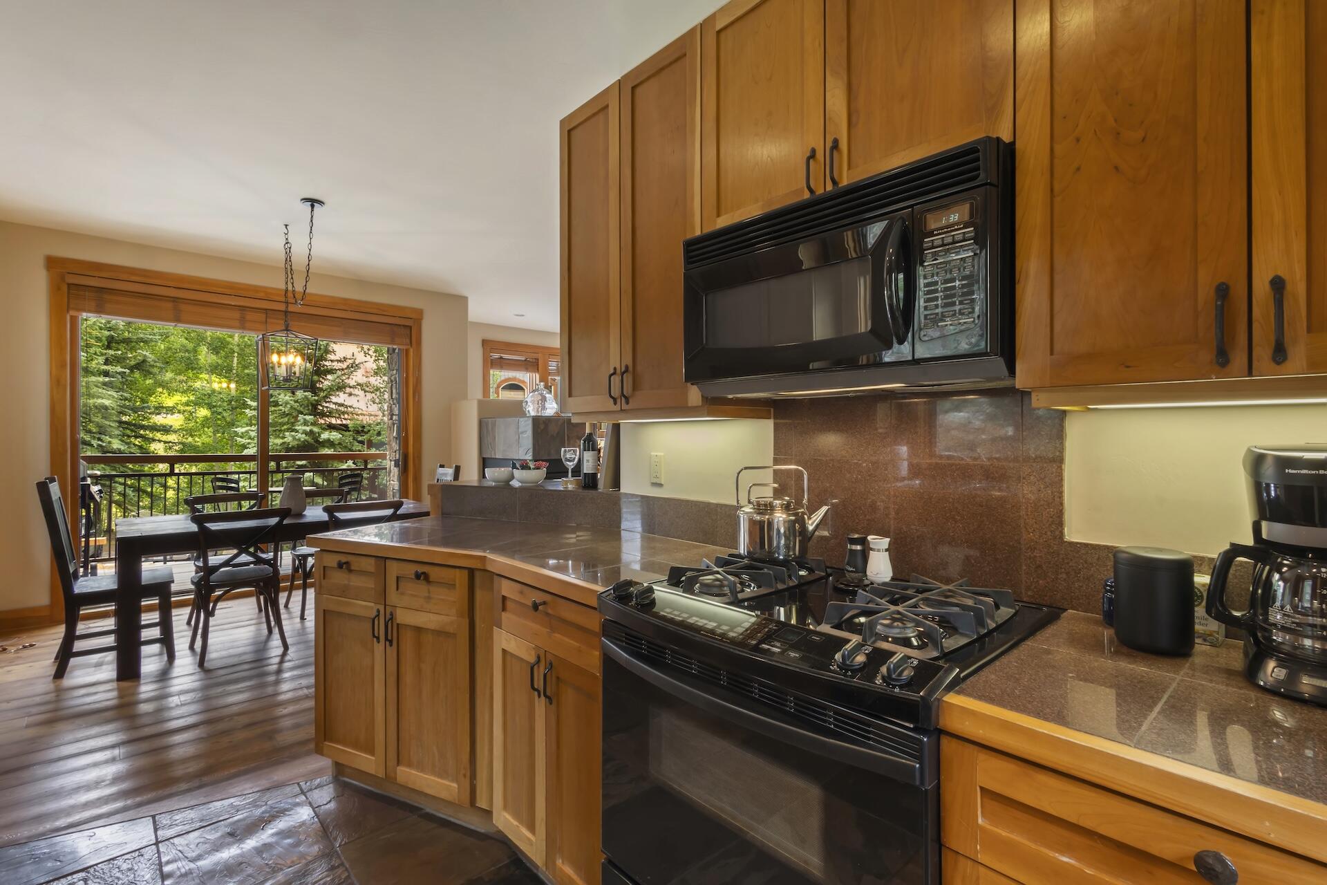 403 Adams Ranch Road, Unit B Mountain Village, CO 81435 - Photo 11 of 28 Kitchen & Dining Area