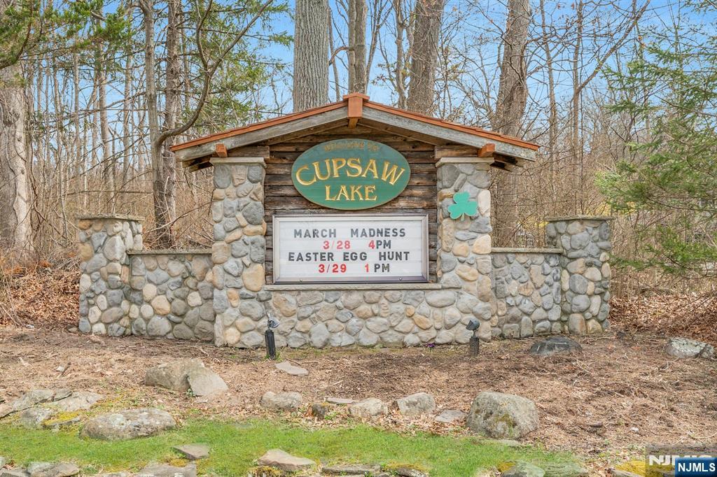 27 Bear Mountain Road Ringwood, NJ 07456 - Photo 2 of 47 a sign broad on the side of a road