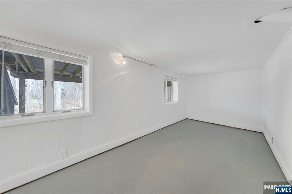 27 Bear Mountain Road Ringwood, NJ 07456 - Photo 34 of 47 an empty room with a window