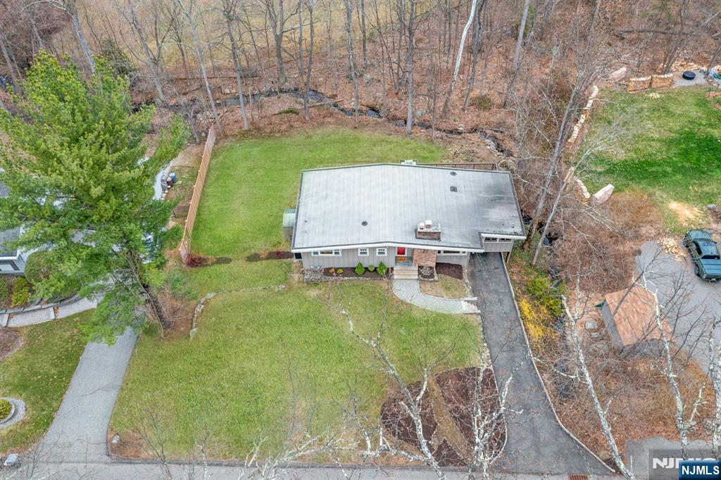 27 Bear Mountain Road Ringwood, NJ 07456 - Photo 46 of 47 swimming pool view with a garden space